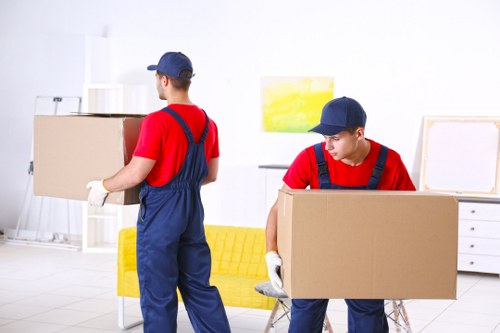 Moving team preparing items safely for a man with van service
