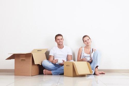 Local movers handling boxes and furniture for a Homerton relocation