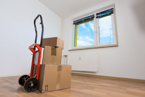Loading boxes and furniture into a van for a local Hackney relocation