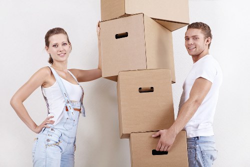 Professional movers handling furniture in Homerton