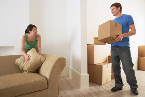 Crew assessing access and handling risks before a home move